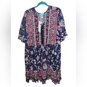 Nouveau Mode blue floral dress with button up front and flowy sleeves. Size:2XL